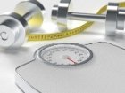 weight scale and dumbbells