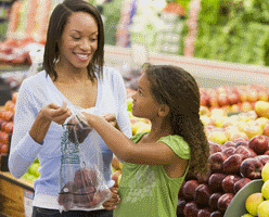 mother and daughter grocery shopping