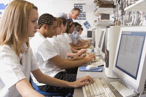 teens in school on computers