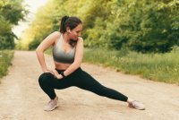 woman stretching before exercise