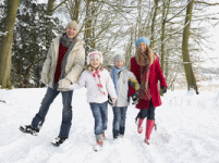 family outdoors during winter