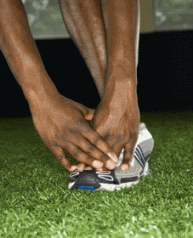 man stretching legs