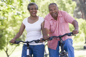 senior couple riding bikes