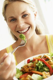 woman eating salad